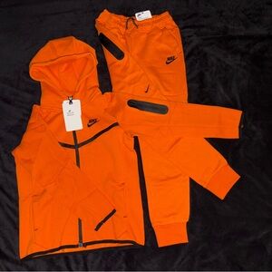 Orange nike tech kids full set (Size 8y)
